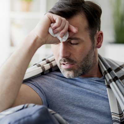 Ill man with a hard flu