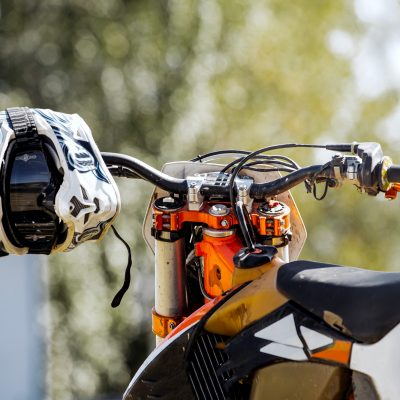 Sports helmet hanging on handlebars
