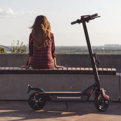 Walk on an electric scooter